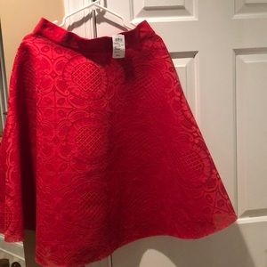 Red Skirt, Zipper up the back, item is new.